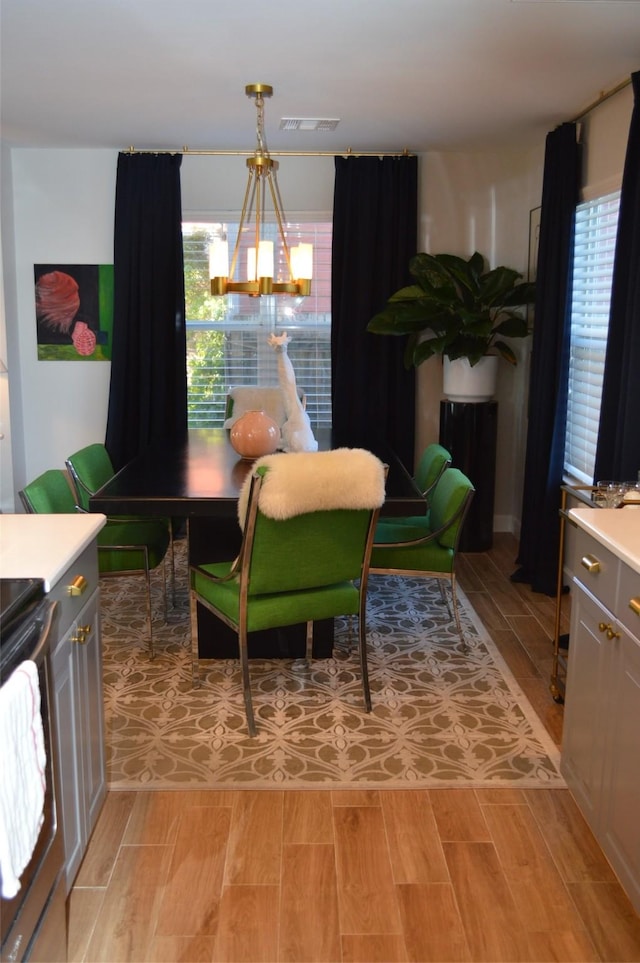 dining area with a notable chandelier