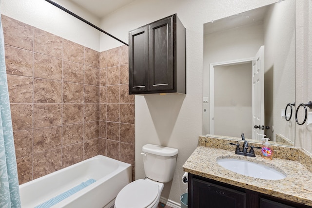 full bathroom featuring toilet, vanity, and shower / bath combo