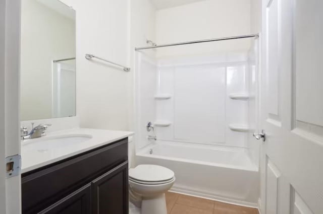 full bathroom featuring toilet, tile patterned flooring, tub / shower combination, and vanity