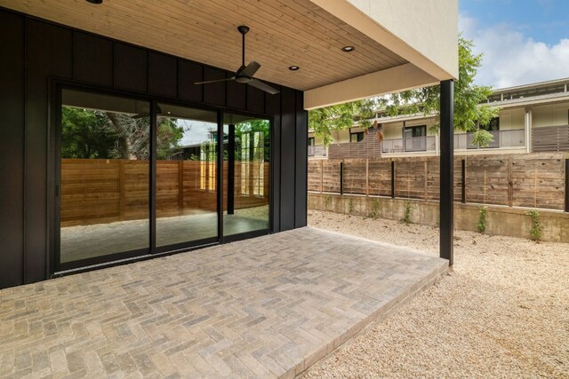 view of patio / terrace featuring ceiling fan