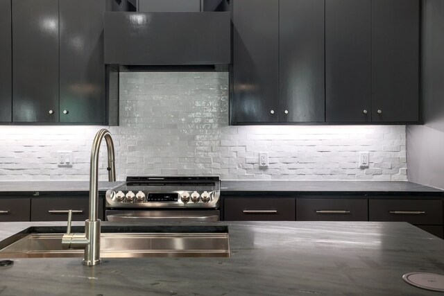 kitchen with backsplash and electric stove