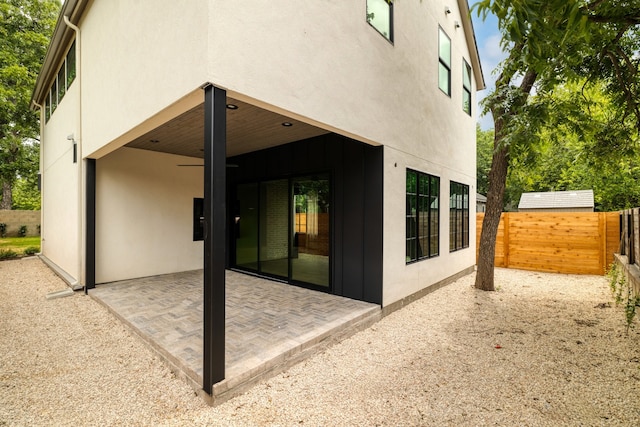 rear view of house with a patio