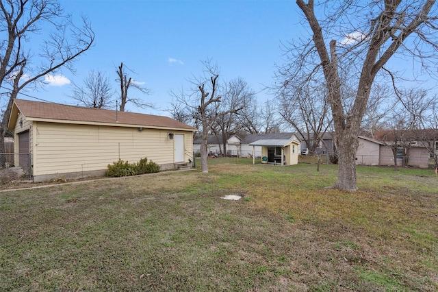 view of yard with an outdoor structure