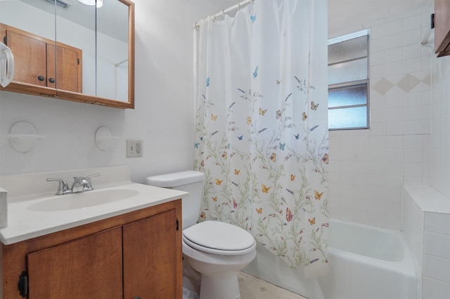 full bathroom with toilet, shower / bath combo, and vanity