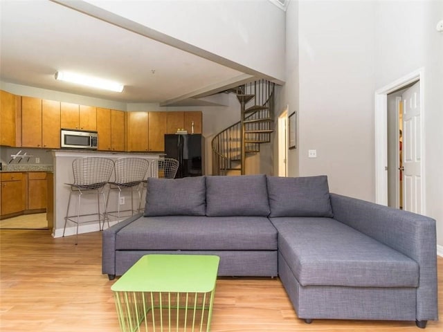 living room with light wood-type flooring