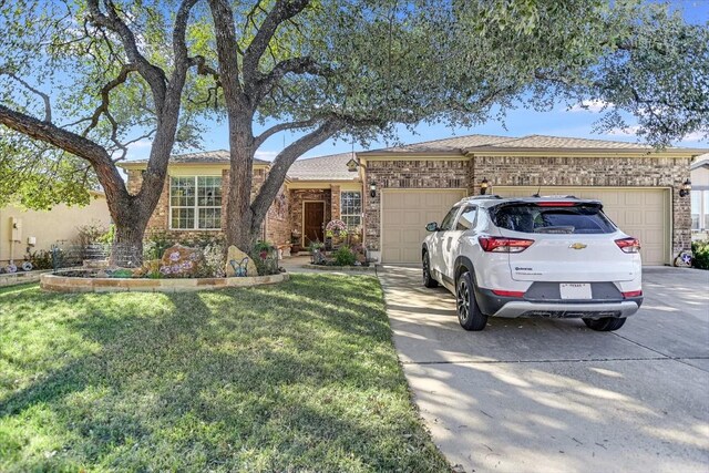 ranch-style home with a garage and a front lawn