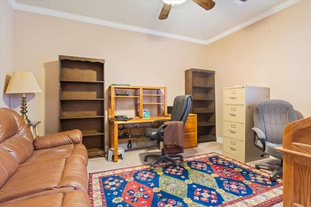 office space with light carpet, a ceiling fan, and crown molding