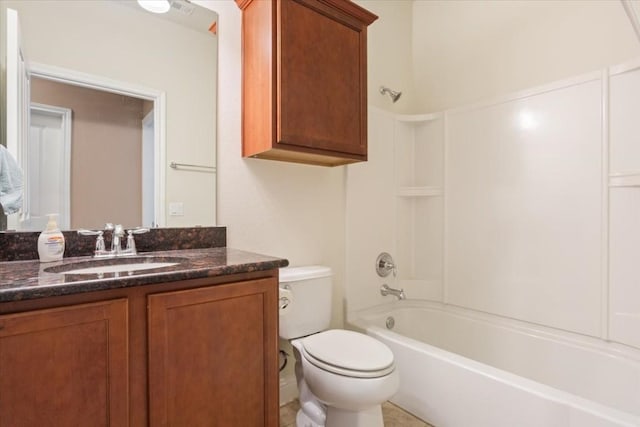 full bathroom featuring toilet, vanity, and bathing tub / shower combination