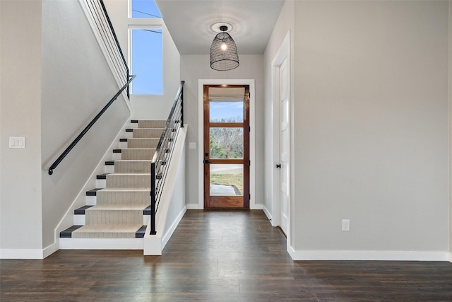 entrance foyer with dark hardwood / wood-style flooring