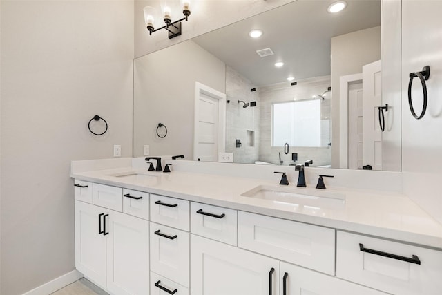 bathroom with vanity and an enclosed shower