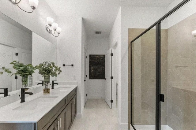 bathroom featuring walk in shower and vanity