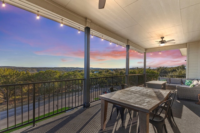 exterior space with ceiling fan and an outdoor hangout area