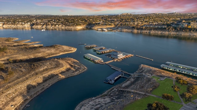 aerial view at dusk with a water view