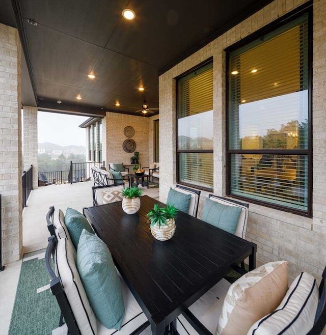 view of patio / terrace with ceiling fan and outdoor lounge area