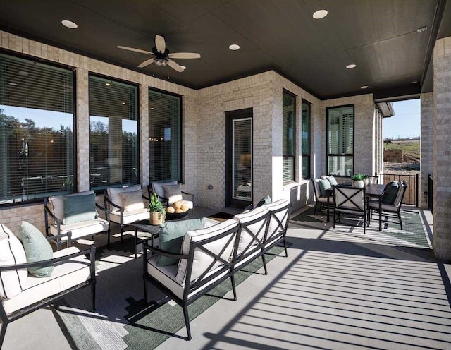 view of patio / terrace with ceiling fan and an outdoor hangout area