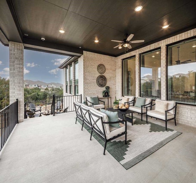 view of patio / terrace with ceiling fan and outdoor lounge area