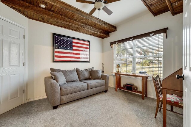 living room with beam ceiling, ceiling fan, carpet flooring, and wooden ceiling