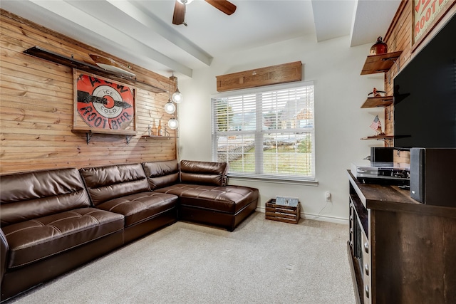 living room featuring ceiling fan and light colored carpet