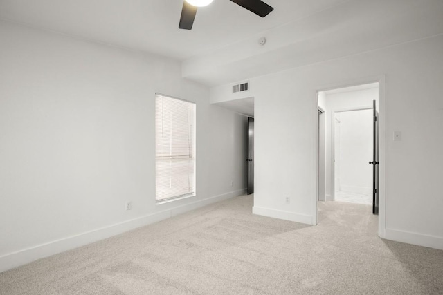 909 Reinli St Unit 103, Austin, TX 78751 - unfurnished bedroom with light colored carpet and ceiling fan