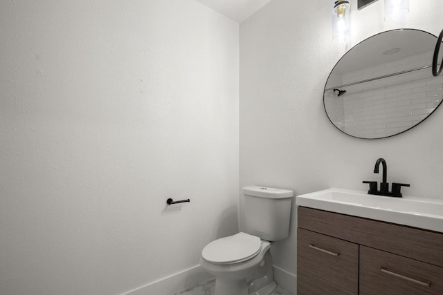 909 Reinli St Unit 103, Austin, TX 78751 - bathroom with vanity, marble finish floors, and a shower