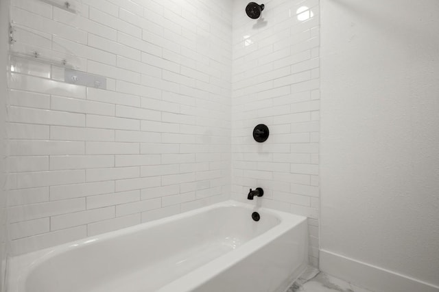 909 Reinli St Unit 103, Austin, TX 78751 - full bathroom with marble finish floors and tub / shower combination
