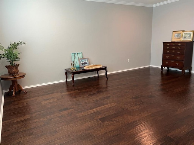 interior space with ornamental molding and dark hardwood / wood-style flooring