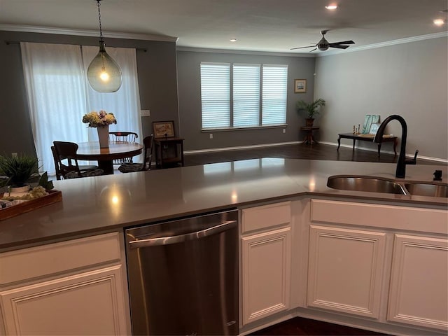 kitchen with ceiling fan, dishwasher, pendant lighting, sink, and white cabinetry