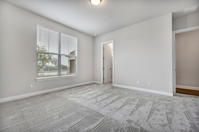 unfurnished bedroom with carpet flooring