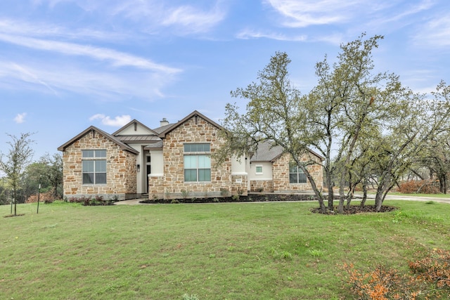 view of front of home featuring a front lawn