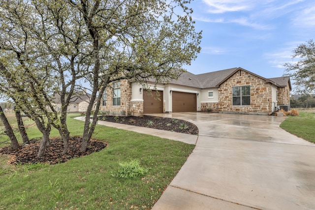 ranch-style home with a front lawn and a garage