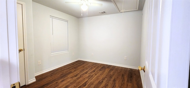 unfurnished room with ceiling fan and dark hardwood / wood-style floors