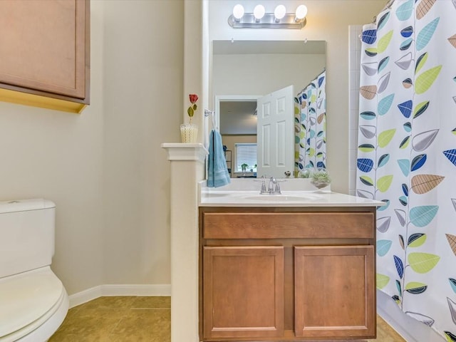 bathroom with a shower with shower curtain, vanity, toilet, and tile patterned flooring