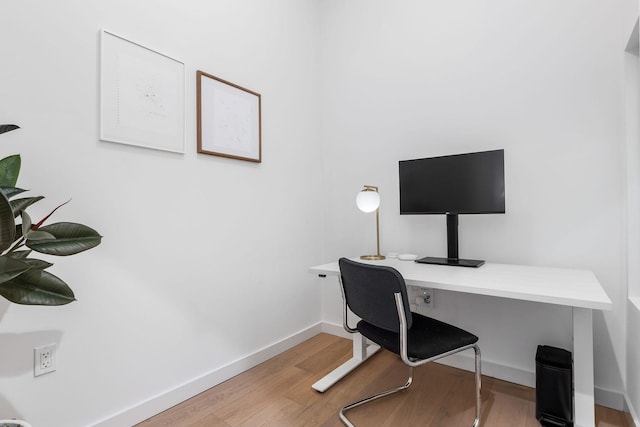 office area with wood-type flooring