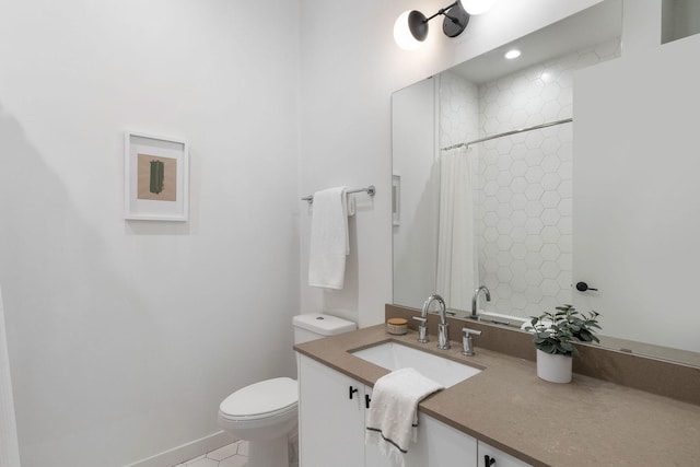 bathroom featuring toilet, vanity, tile patterned floors, and a shower with shower curtain