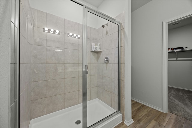 bathroom with an enclosed shower