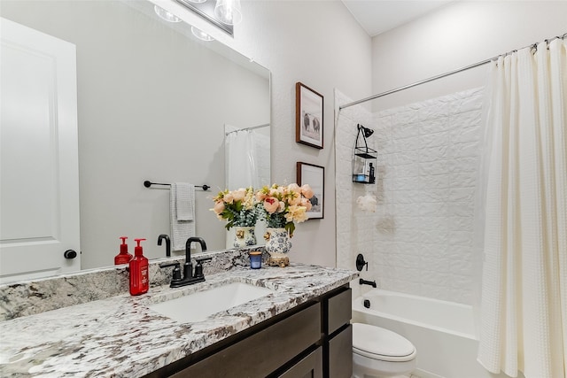 full bathroom with toilet, vanity, and shower / tub combo with curtain