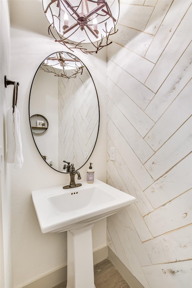 bathroom with sink and wood-type flooring