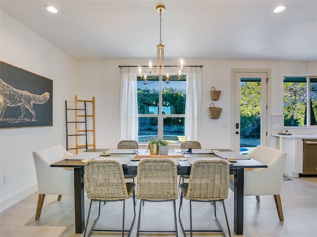 dining area with a notable chandelier