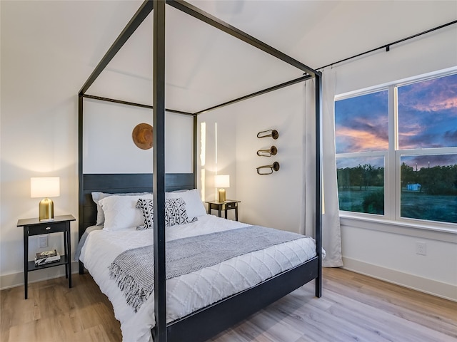 bedroom featuring hardwood / wood-style floors