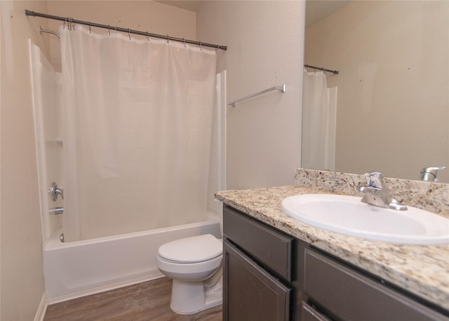 full bathroom with wood-type flooring, toilet, vanity, and shower / bathtub combination with curtain