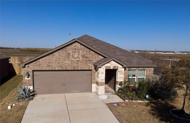 single story home featuring a garage