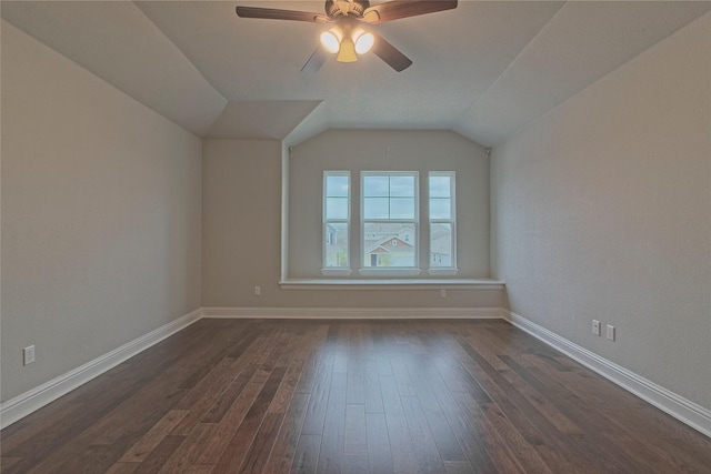 bonus room with lofted ceiling, ceiling fan, and dark hardwood / wood-style floors