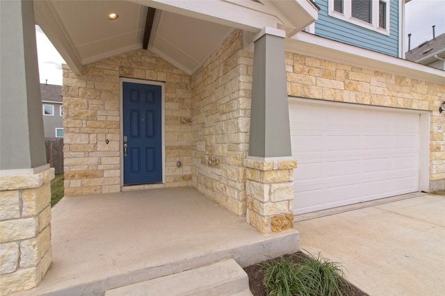 property entrance featuring a garage