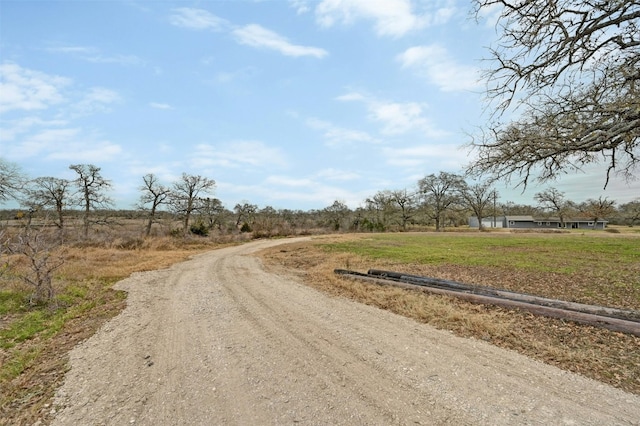 view of road with a rural view