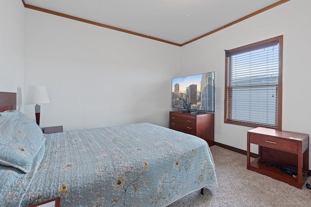 carpeted bedroom with crown molding