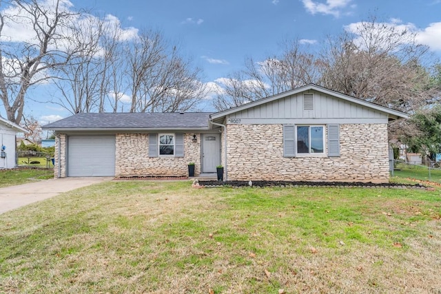 ranch-style house featuring concrete driveway, a front lawn, an attached garage, and stone siding