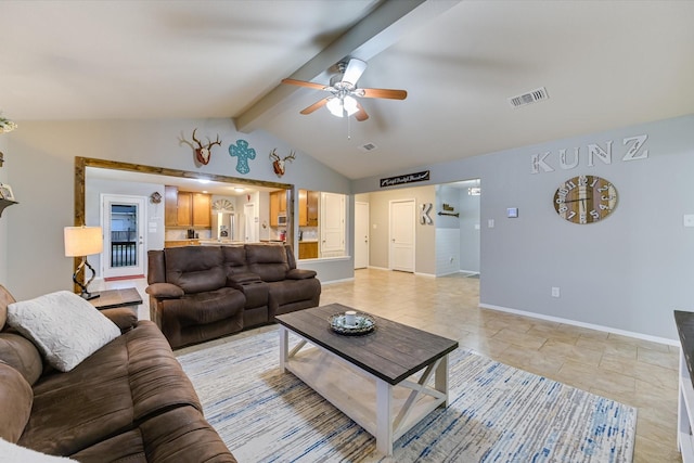 tiled living room featuring ceiling fan and lofted ceiling with beams