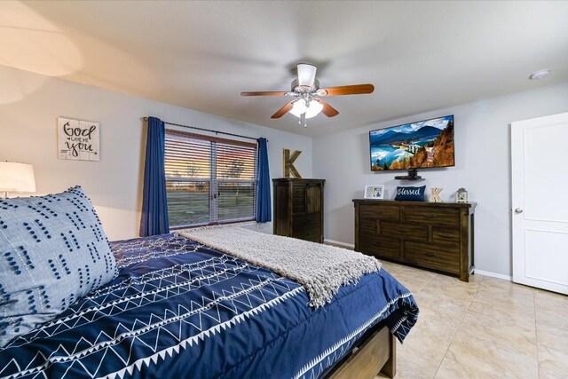 190 Margies Way, Bastrop, TX 78602 - tiled bedroom featuring ceiling fan