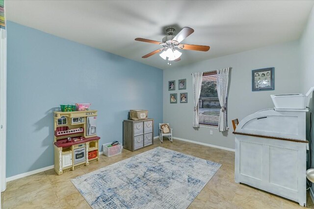 190 Margies Way, Bastrop, TX 78602 - recreation room with a ceiling fan, baseboards, and tile patterned flooring
