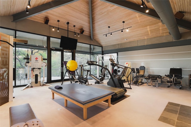 workout area featuring wooden ceiling and high vaulted ceiling